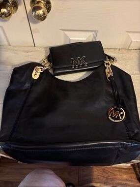 Michael Kors Black Leather Shoulder Bag with Gold Hardware and MK Charm